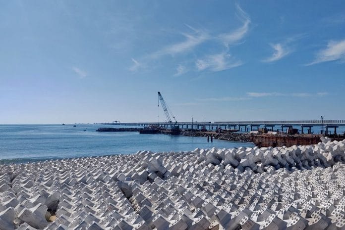 A view of an under-construction coal jetty of the planned 1,320-megawatt power plant on the coastline near Udangudi, Tamil Nadu | File Photo: Reuters