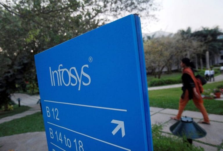 Infosys tumbles 15% on downbeat revenue outlook