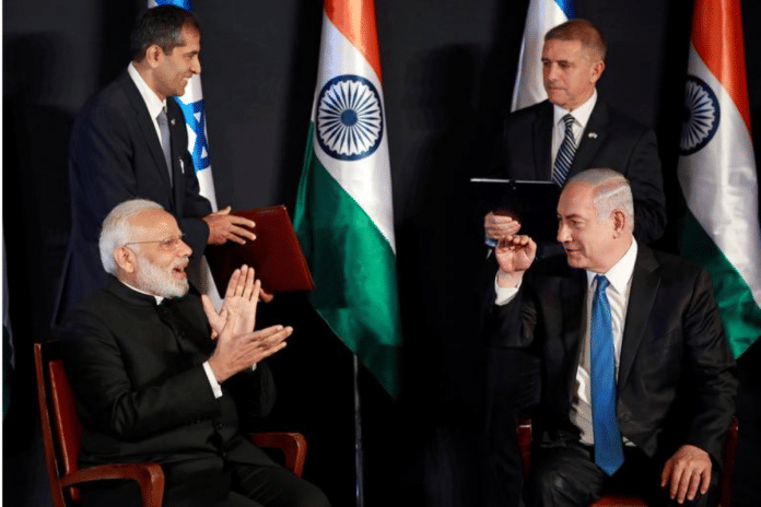 Indian Prime Minister Narendra Modi and Israeli Prime Minister Benjamin Netanyahu joke during an exchange of co-operation agreements ceremony in Jerusalem July 5, 2017. REUTERS/Amir Cohen