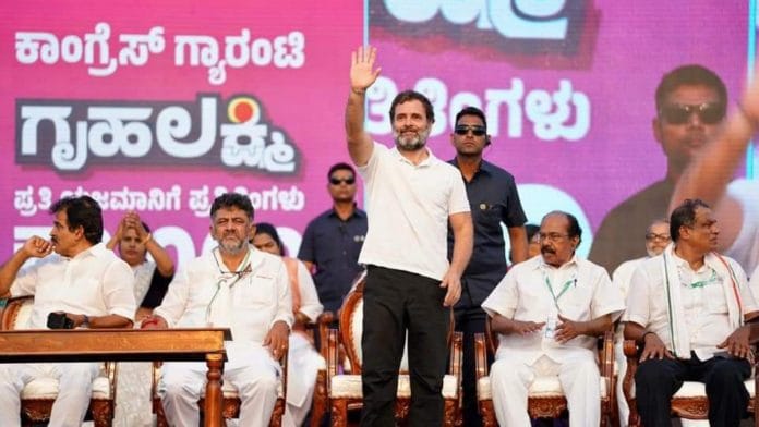 Congress leader Rahul Gandhi at a public meeting in Mangaluru, Thursday. Congress leaders D.K. Shivakumar and K.C. Venugopal were also present | Twitter: @INCKarnataka