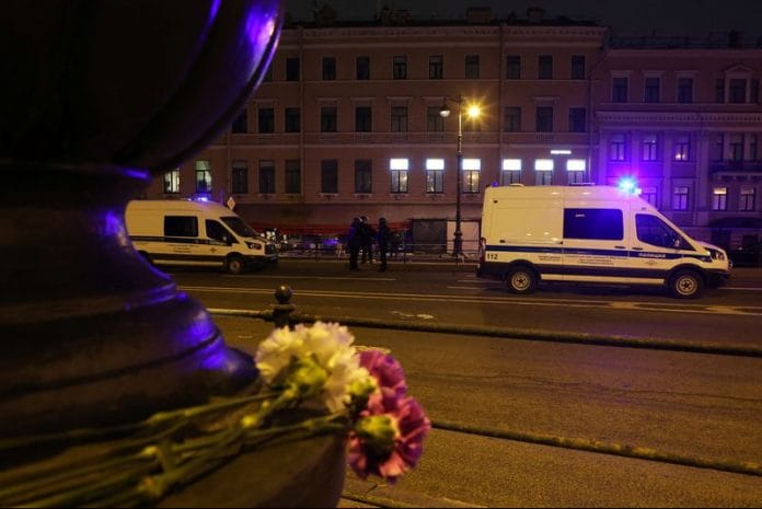 Investigators work at the site of an explosion in a cafe in Saint Petersburg, Russia on 2 April, 2023 | Reuters