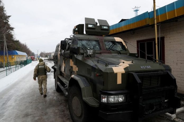 A member of the Ukrainian State Border Guard Service keeps watch at the Senkivka checkpoint near the border with Belarus and Russia in the Chernihiv region, Ukraine | Reuters file photo
