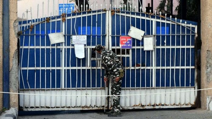 A security person stands guard at Tihar Jail | Credit: ANI Photo
