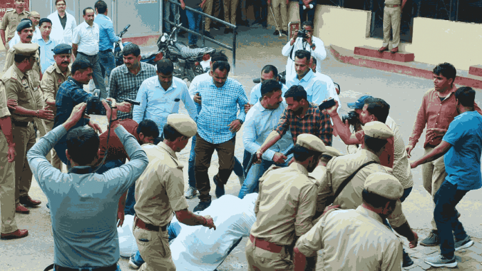 Special Investigation Team (SIT) and the forensic team recreate the crime scene, where three assailants shot dead gangster-turned-politician Atiq Ahmed and his brother Ashraf on 15 April, in Prayagraj Thursday | ANI