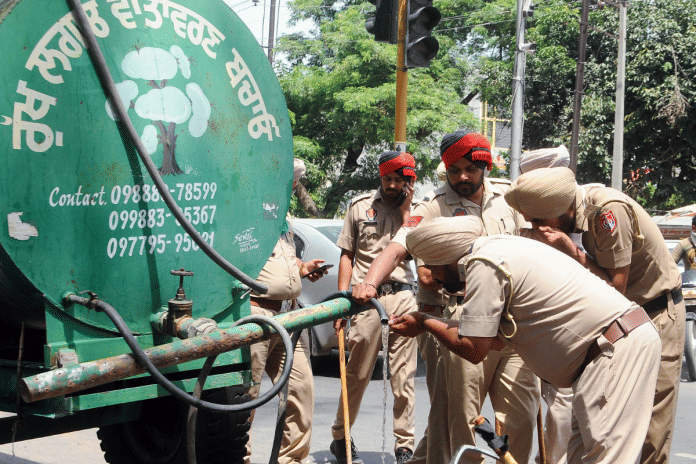 Like in the northern plains, summers in Punjab are scorching hot. Punjab policemen quench their thirst from a water tank in Patiala | ANI File Photo