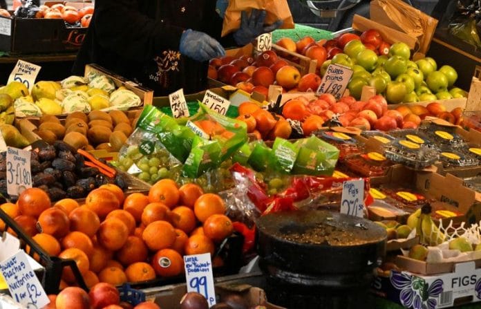 Fresh produce is displayed at a fruit and vegetable stall at Portobello Road in London | Reuters file photo