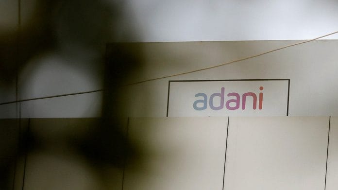 The logo of the Adani Group is seen on one of its buildings in Ahmedabad | Reuters