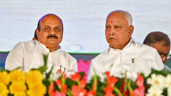 Karnataka Chief Minister Basavaraj Bommai and BJP leader B.S. Yediyurappa at an event | File photo/ANI