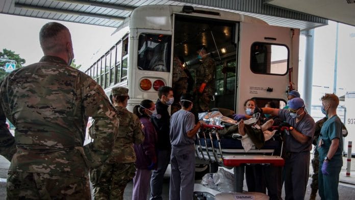 US Soldiers, Airmen and civilian staff receive casualties who were injured outside of Hamid Karzai International Airport and evacuated for further care in Germany | Landstuhl Regional Medical Center/Marcy Sanchez/Handout via Reuters
