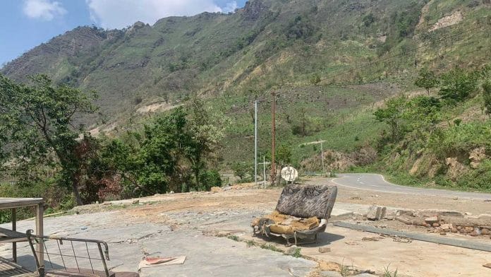 A dilapidated chair is one of the few remnants of K. Songjang village, which once stood on the edge of Old Cachar Road, under Henglep sub-division of Churachandpur district | Karishma Hasnat | ThePrint