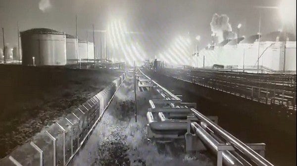 A screengrab of a video showing drones attack on Russian Oil Depot in Krasnodar | Image Credit: Twitter/@RT_com