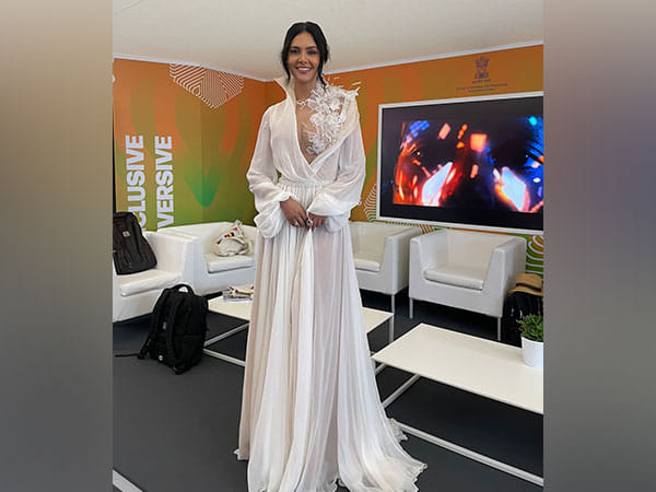 Esha Gupta looks gorgeous in a white thigh-high slit gown on Cannes Film Festival red carpet