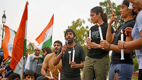 Wrestlers hold candlelight protest demanding arrest of Brij Bhushan