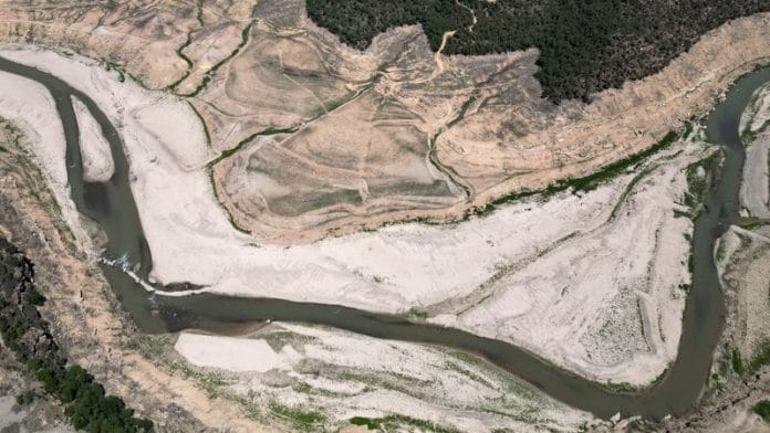 A view shows the ground of the Rialb reservoir as drinking water supplies have plunged to their lowest level since 1990 due to extreme drought, in the village of Bassella, Spain on 6 May, 2023 | Reuters
