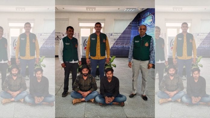 Police personnel with two of the accused (sitting) apprehended in Neem Ka Thana | Courtesy: Delhi Police