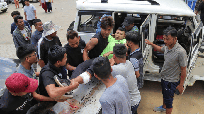 The injured outside the Churachandpur district hospital | Suraj Singh Bisht | ThePrint