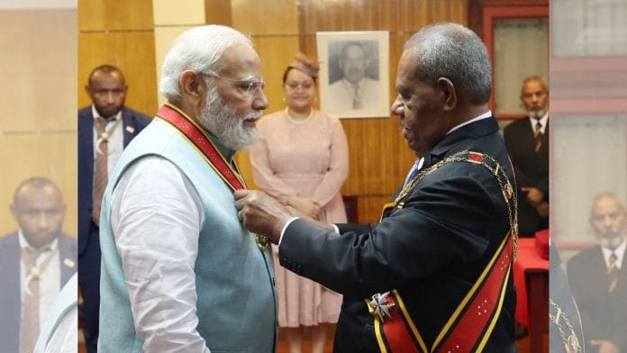 Governor-General Sir Bob Dadae of Papua New Guinea conferred PM Narendra Modi with the country's highest civilian award, Grand Companion of the Order of Logohu (GCL) | Twitter/@MEAIndia