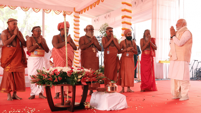 Prime Minister Narendra Modi with the seers during the ceremony to mark the beginning of the inauguration of the new Parliament building on Sunday| ANI