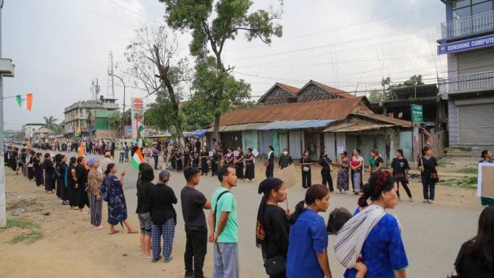 Residents of Churachandpur district form a human chain on the road | Suraj Singh Bisht | ThePrint