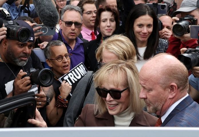 E. Jean Carroll departs from the Manhattan Federal Court following the verdict in the civil rape accusation case against former US President Donald Trump, in New York City, on 9 May 2023 | Reuters