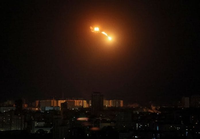 An explosion of a drone is seen in the sky over the city during a Russian drone strike in Kyiv, Ukraine, on 8 May 2023 | Reuters