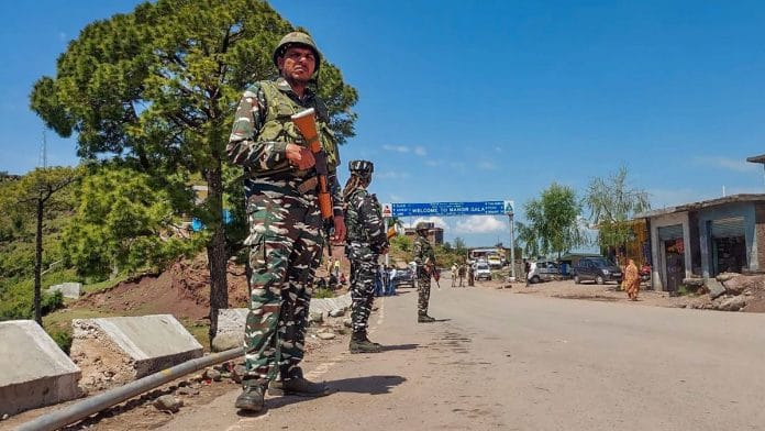 Security personnel near the site of an encounter with terrorists in Kandi area of Rajouri district, on 5 May, 2023 | PTI Photo