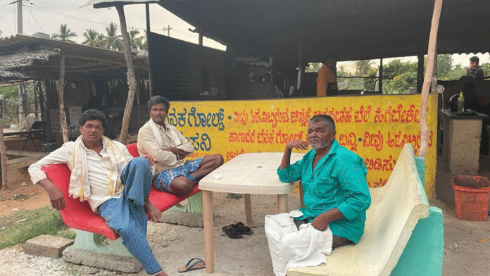Local residents take a break to escape the afternoon sun in Congress state president D.K.Shivakumar's constituency Kanakapura | Shanker Arnimesh | ThePrint