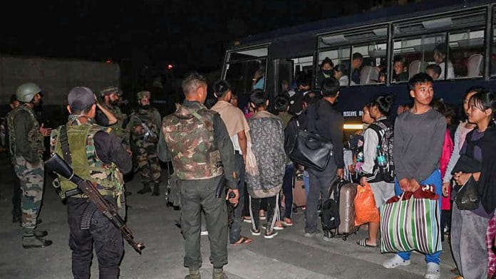 Indian Army and Assam Rifles personnel rescue civilians from violence-hit areas, in Manipur | PTI Photo