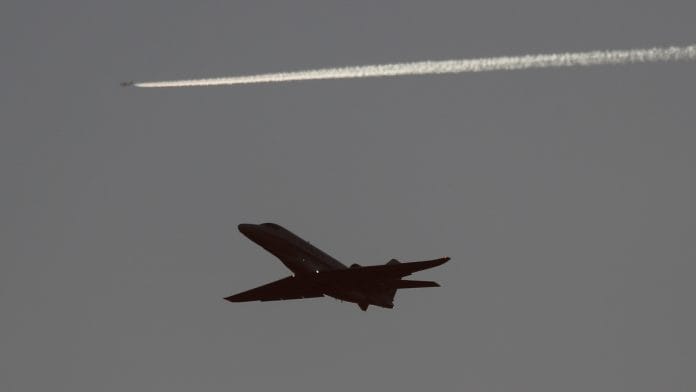 A passenger plane takes off from London Luton airport | Reuters