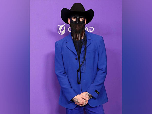 Masked singer Orville Peck postpones upcoming shows to focus on mental health