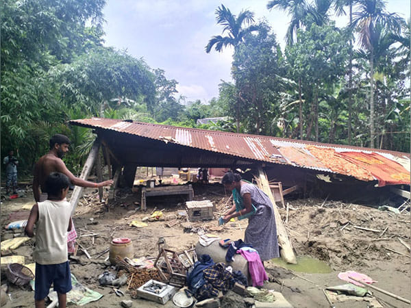 Assam: Local people in Bajali district take shelter on embankments amid heavy flood