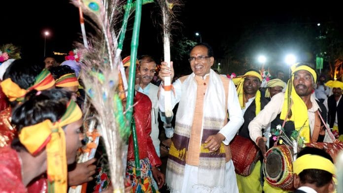 Representational image of Madhya Pradesh Chief Minister Shivraj Singh Chouhan with tribal artists in Chhatarpur, 2022 | Photo: ANI