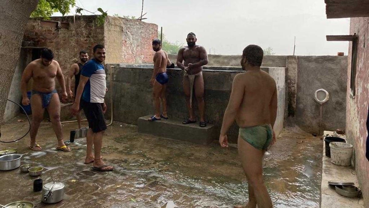 Wrestlers at 'Motu Coach Ka Akhara' in Ladpur village | Sushil Manav | ThePrint