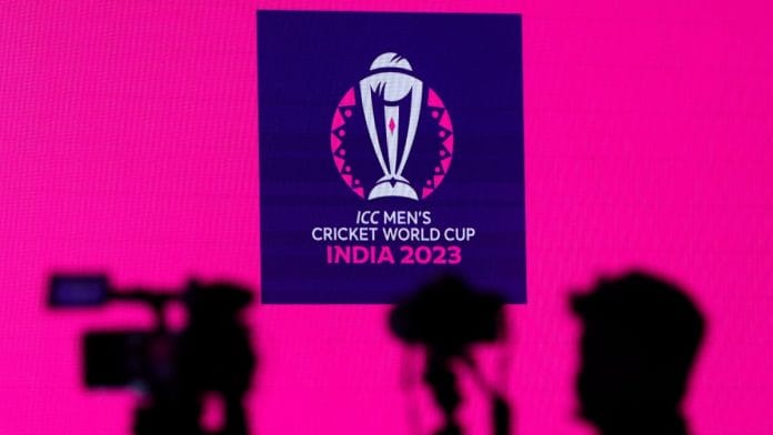 Cameras are seen in front of the logo of the upcoming ICC Men's Cricket World Cup before a press conference in Mumbai, on June 27, 2023 | Reuters/Francis Mascarenhas