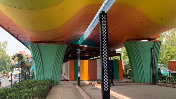 View of the construction site with paved way leading to new the sports complex | Image by Shania Mathew/ThePrint