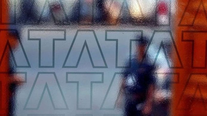 A private security guard stands at the exit gate of the headquarters of Tata Consultancy Services (TCS) in Mumbai | File Photo: Reuters