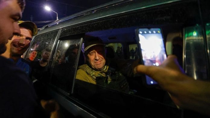 Wagner mercenary chief Yevgeny Prigozhin leaves the headquarters of the Southern Military District amid the group's pullout from the city of Rostov-on-Don, Russia, June 24, 2023/Reuters