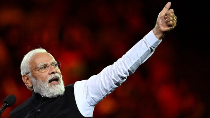 PM Narendra Modi addresses attendees during a community event at Qudos Bank Arena in Sydney, Australia, on 23 May 2023 | AAP Image/Dean Lewins via Reuters