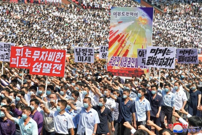 People attend a mass rally denouncing the US in Pyongyang, North Korea, on June 25, 2023 | KCNA via Reuters