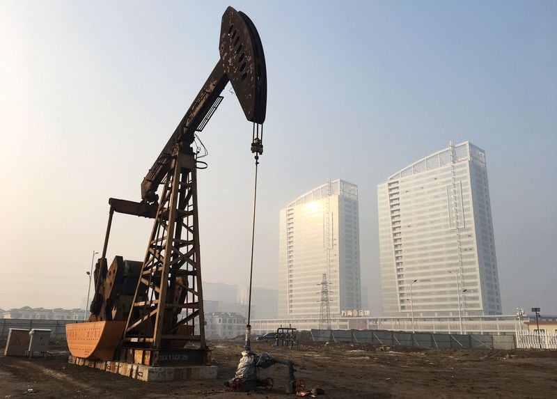 Oil prices edge higher as Saudi output cuts outweigh weak demand ...