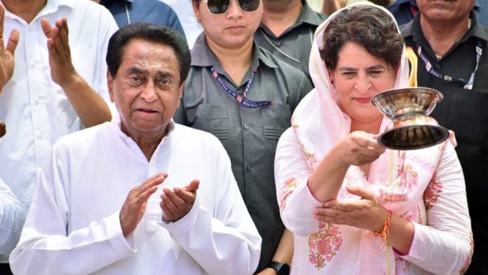 Congress leader Priyanka Gandhi Vadra and former Madhya Pradesh CM Kamal Nath perform Narmada puja at Gwarighat in Jabalpur Monday | ANI