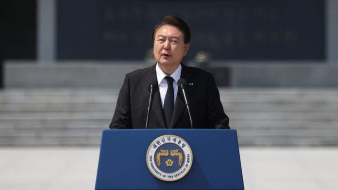 South Korean President Yoon Suk Yeol and his wife Kim Keon-hee delivers his speech during a ceremony marking the 68th Memorial Day at the National cemetery in Seoul, South Korea, on 6 June, 2023 | Reuters