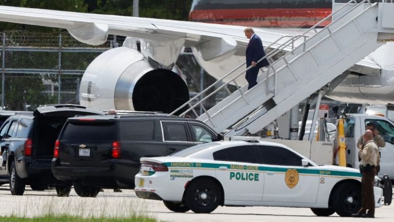 Donald Trump arrives in Florida to face federal criminal charges, maintains lead in poll