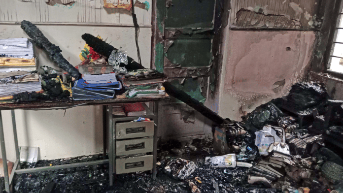 A view of the charred remains of the official residence of Manipur Minister Nemcha Kipgen after it was burned down by miscreants, in Imphal on Thursday.