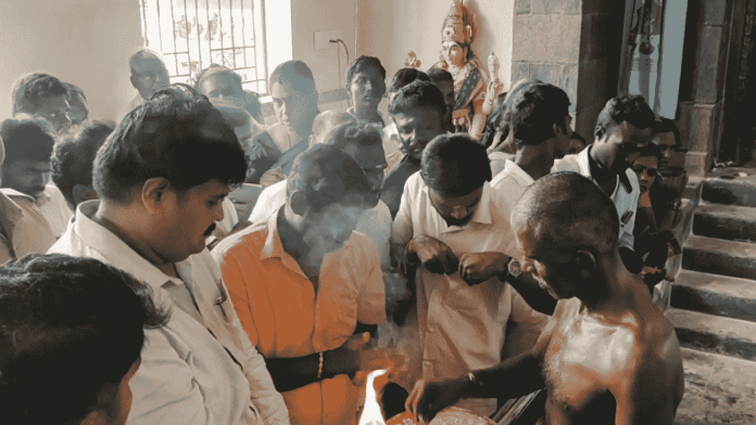 District Magistrate T. Prabhushankar at Sri Kaliamman temple in Veeranampatti village after it was reopened | By special arrangement