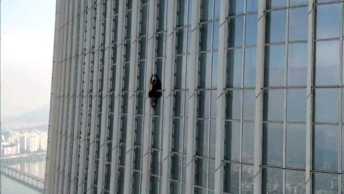 A British man climbs Lotte World Tower in Seoul, South Korea, on 12 June 2023 | South Korea's Songpa Fire Station/Handout via Reuters