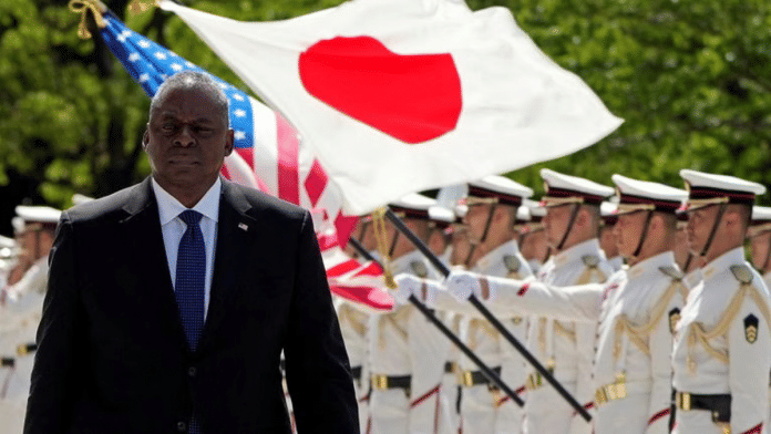 US Secretary of Defense Lloyd Austin reviews the guard of honour at the Japanese Defense Ministry in Tokyo, Japan, 1 June 2023/Reuters