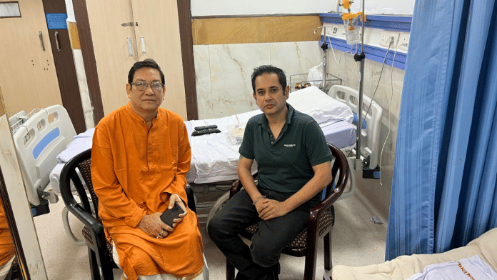 TIPRA Motha chairman Pradyot Kishore Debbarma with Tripura Congress chief Birajit Sinha at AIIMS in Delhi | Twitter | @PradyotManikya