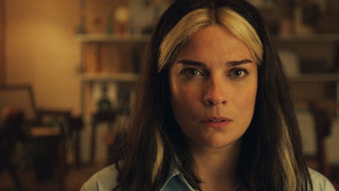 Annie Murphy in a still from season six's first episode, Joan is Awful | Screengrab taken from Netflix trailer