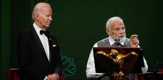 India's Prime Minister Narendra Modi speaks next to U.S. President Joe Biden during an official state dinner at the White House in Washington, US | Reuters/Elizabeth Frantz